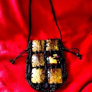 Braided unique purse Thailand.